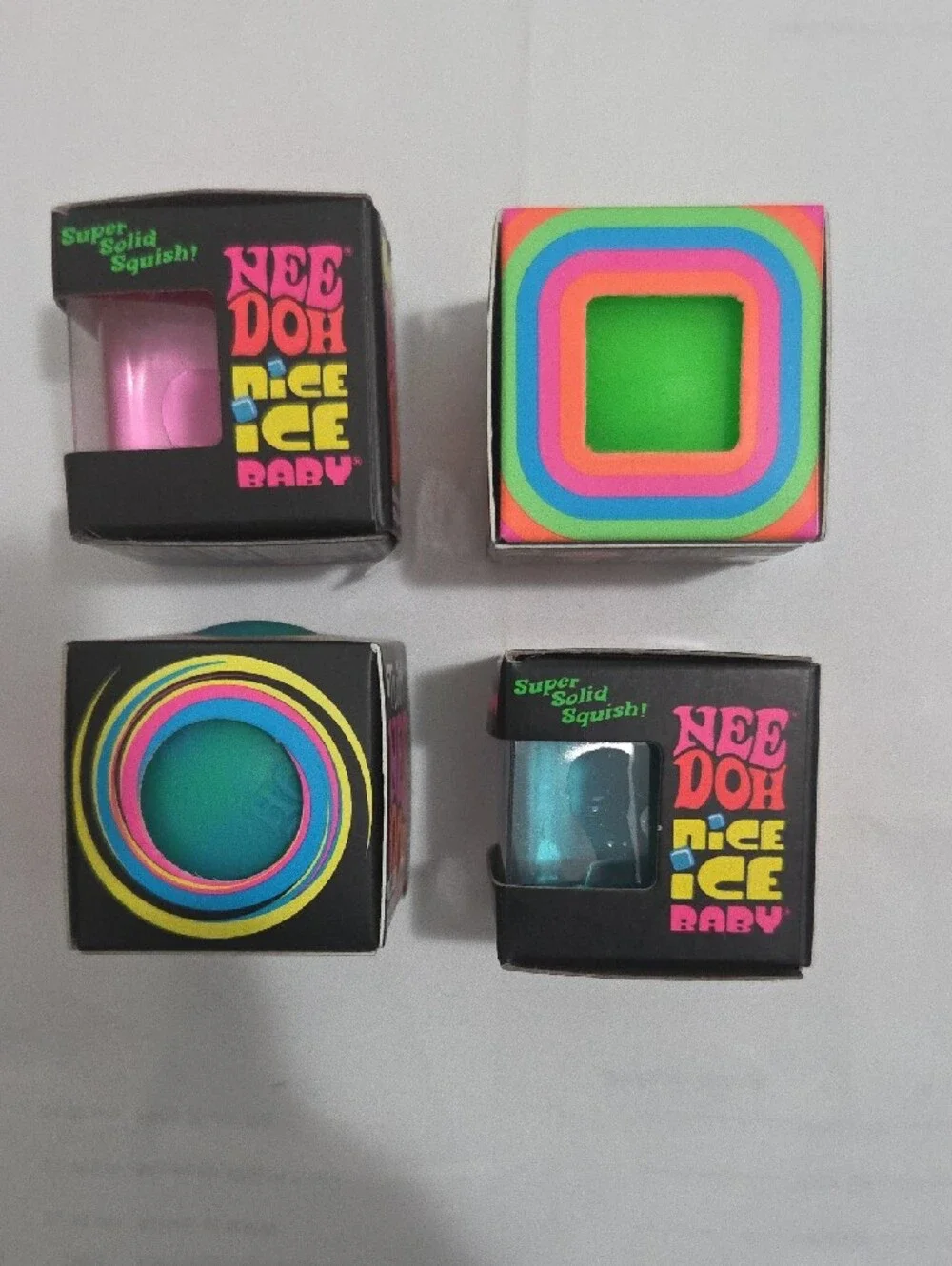 Nee Doh Cube & Twirl Set - Pink,Green & Teal Squish Toys